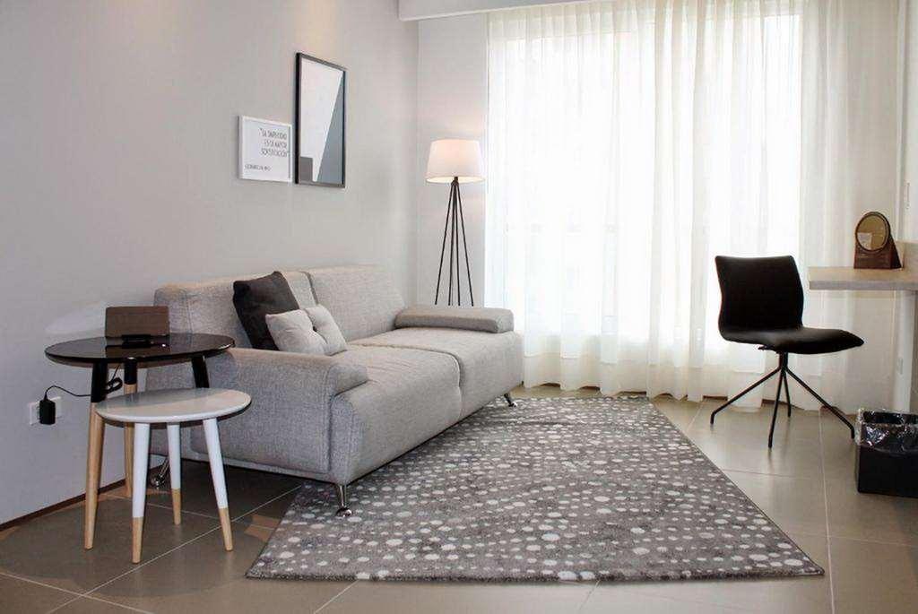 Quo Quality Hotel Manizales Pokój zdjęcie A living room with a rug